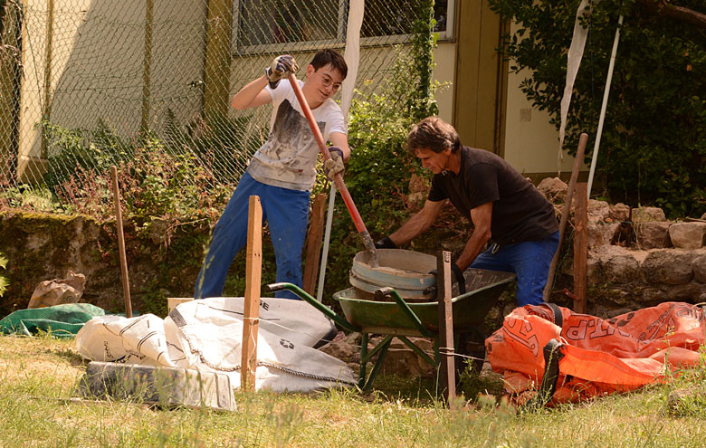 ATD Volunteer Corps member (right) at a youth workcamp.